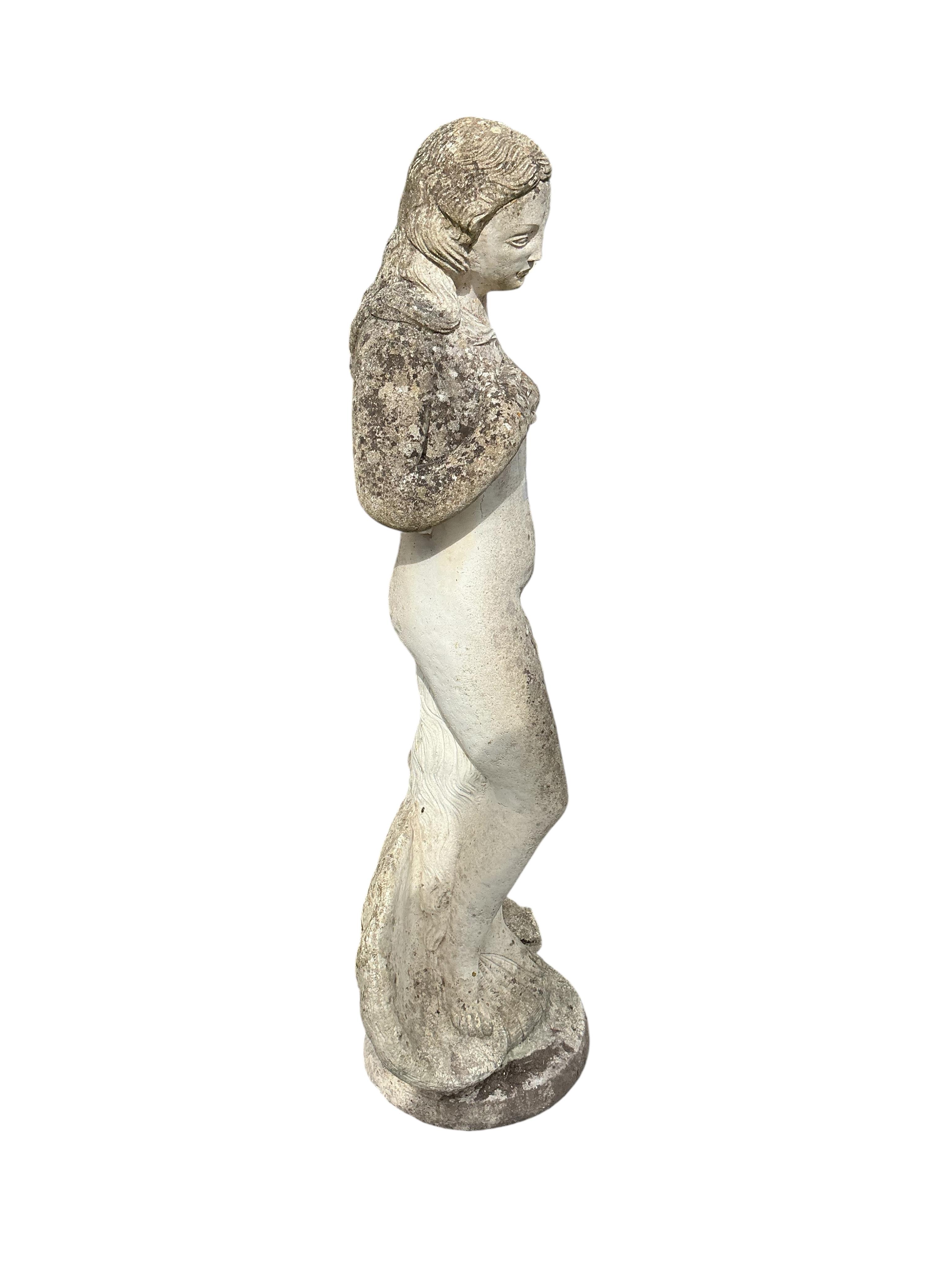 A reconstituted stone Venus garden ornament, height 120cm